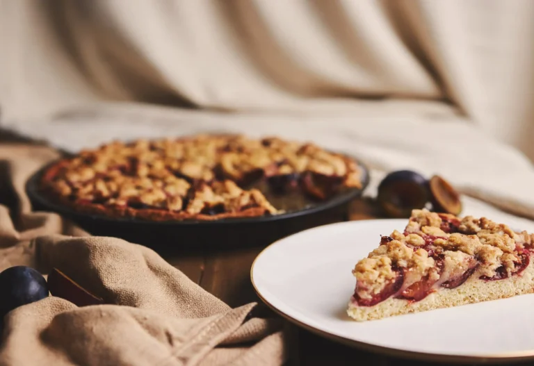 delicious-plum-pie-with-chemex-coffee-ingredients-with-fabric-wooden-table-with-fabric (Web H)